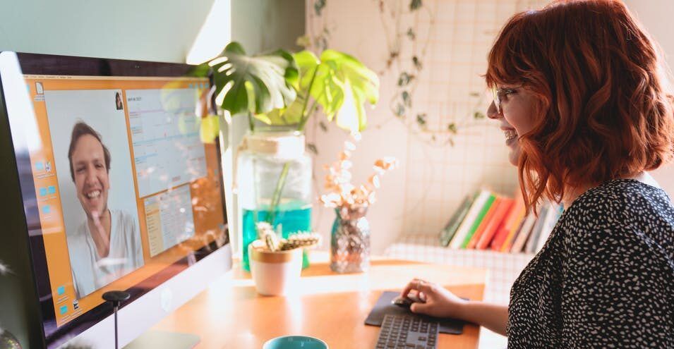 people smiling on a zoom call - cyber risk, Cyberscore, cybersecurity companies Chicago