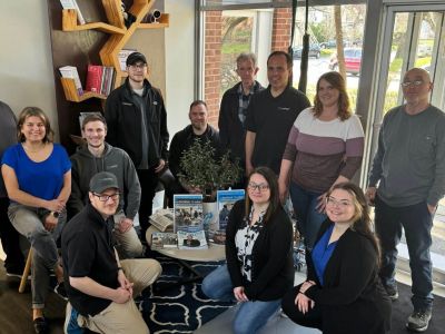 Group of 11 LeadingIT employees smiling